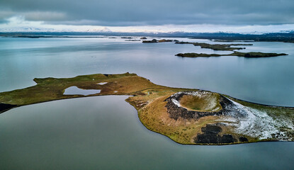 Aerial View of Volcanic Crater at Lake Myvatn's Serene Waters © Arakawa27