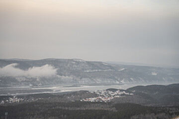 Fototapeta premium Enisey river in winter with frozen trees