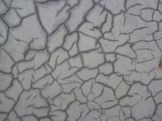 A photography grey cracked concrete wall texture background