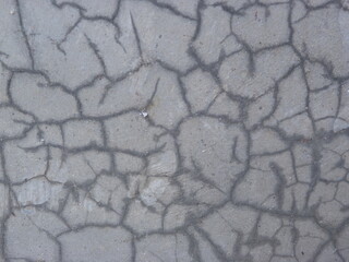 A photography grey cracked concrete wall texture background