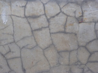 A photography grey cracked concrete wall texture background