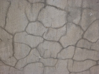 A photography grey cracked concrete wall texture background
