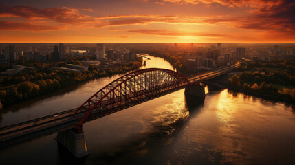 Fototapeta premium Urban Sunset Glow Over River Bridge