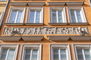 Świętojańska 11 - Ptaszyński's tenement house. Old Town in Warsaw, Poland. Facade of a historic building in the city center.