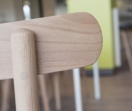 Wooden chair. Interior design. Wooden furniture. At home. Moern design. Table.