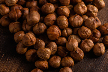 Raw, unshelled hazelnuts close-up. Hazelnut