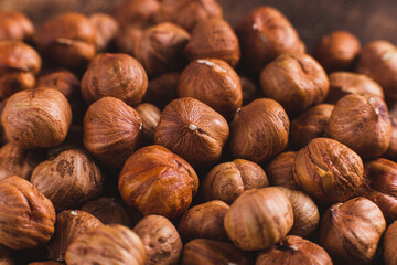 Raw, unshelled hazelnuts close-up. Hazelnut