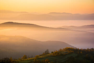 mountainous landscape with fog in the valley. autmn environment. sunny morning. countryside scenery...