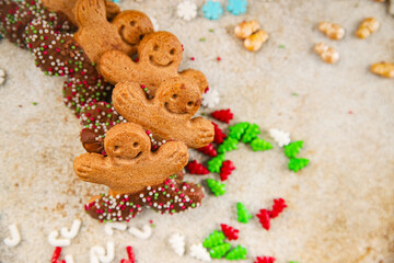 Gingerbread man ginger cookies christmas party delicious dessert christmas treat fresh delicious gourmet food background on the table rustic copy space top view