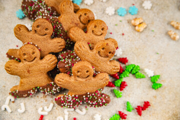 Gingerbread man ginger cookies christmas party delicious dessert christmas treat fresh delicious gourmet food background on the table rustic copy space top view