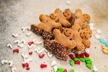 Gingerbread man ginger cookies christmas party delicious dessert christmas treat fresh delicious gourmet food background on the table rustic copy space top view