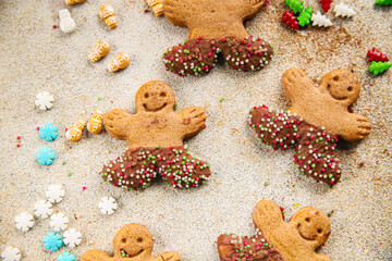 Gingerbread man ginger cookies christmas party delicious dessert christmas treat fresh delicious gourmet food background on the table rustic copy space top view