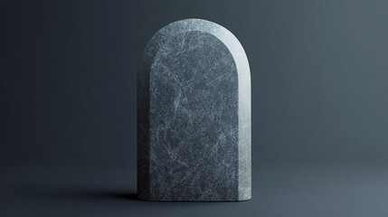 Simple Grey Headstone With Rounded Top, crafted from smooth stone, ideal for memorials or gravesites