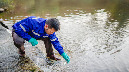 Water resource engineers check the purity of water flowing through pipes from natural water sources...