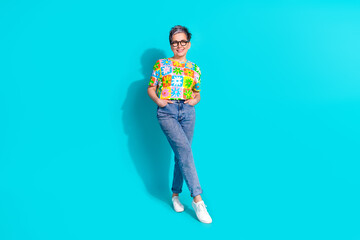 Full length portrait of pretty aged lady posing empty space isolated on turquoise color background