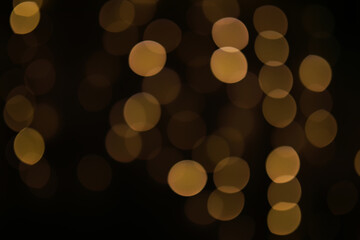Abstract Blurred Golden Lights Bokeh Background for Festive and Holiday Themes