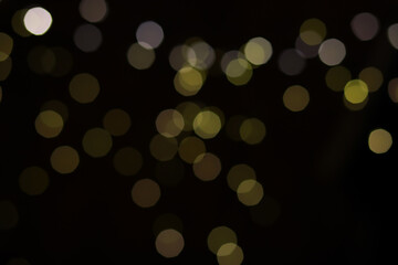 Mystical Golden and White Bokeh Lights on Dark Background - Abstract, Dreamy, Celebratory Atmosphere