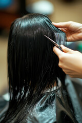 Fototapeta premium Hairdresser cutting client's hair with scissors in salon
