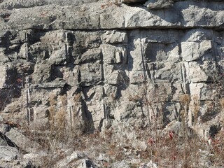 stone wall background abandoned quarry surface