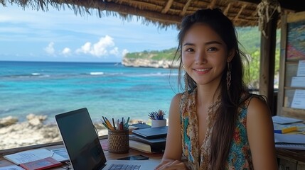 Young Woman Working by the Ocean Shore