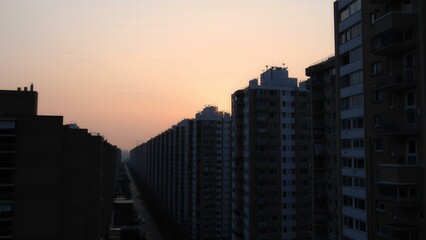 Fototapeta premium Urban Sunset Silhouette: Captivating Cityscape at Dusk, Perfect for Wall Art and Home Decor