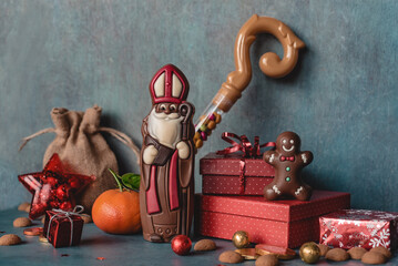 Chocolate figurine Saint Nicholas with candy and gifts