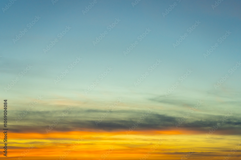 Canvas Prints sky with colorful pink golden and dark cirrus clouds at sunset. abstract texture background pattern.