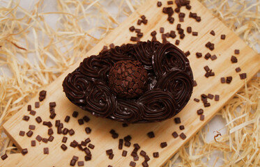 Gourmet chocolate Easter egg on the table