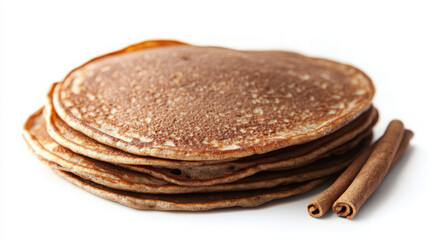 A stack of brown pancakes served with cinnamon sticks, ideal for breakfast or brunch.