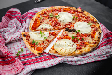 Pizza goat cheese, tomato sauce, bacon tasty food dish fresh delicious gourmet food background on the table rustic food top view copy space top view