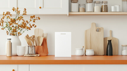 A modern kitchen scene featuring clean countertop with white box, wooden cutting boards, and various kitchen utensils. arrangement exudes warm and inviting atmosphere
