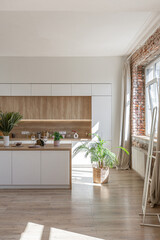 Fototapeta premium Bright and spacious living area featuring modern furniture and natural light in a stylish apartment in soft warm colors