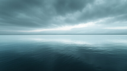Obraz premium Blue Monday empty seascape with calm ocean and dramatic overcast sky, capturing serene yet melancholic mood in muted blue tones, winter blues and introspective solitude in minimalist watercolor style