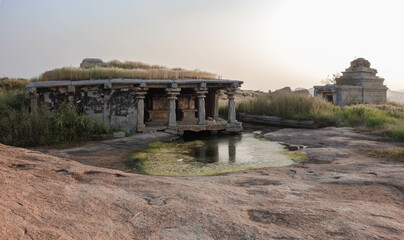 Temples on the gentle slopes of Hemakutta Hill. Hampi, India