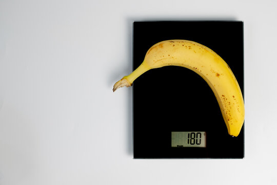 Banana on kitchen scales for measurement