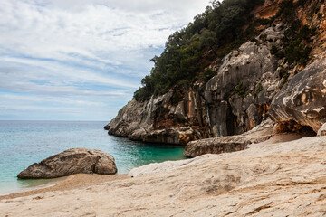 Cala Goloritze. Beautiful beach on the eastern coast of Sardinia. Crystal clear Mediterranean sea and cliffs of Gulf of Orosei. Baunei area, Sardinia, Italy.