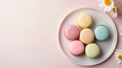 Colorful pastel macarons beautifully arranged on a white plate