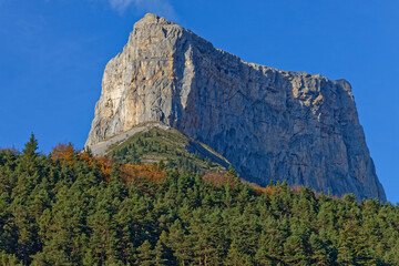 Mont Aiguille (2,087 m), in the Vercors Massif of the French Prealps, known as one of the Seven Wonders of Dauphiné, is a flat limestone mesa surrounded by steep cliffs.