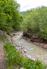 nature park , spring mood, a walk along the riverbed with an overview of the stone riverbed and...