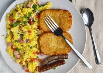 scramble eggs with hash browns and  sausages