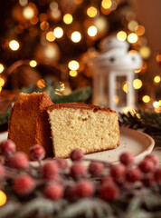 Cake surrounded by festive decorations, creating a cozy holiday vibe. Perfect for Christmas, holiday season, or festive celebrations. Keywords: Christmas cake, holiday food.