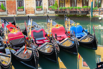 Colorful Gondolas Docked Near Hotel in Venice