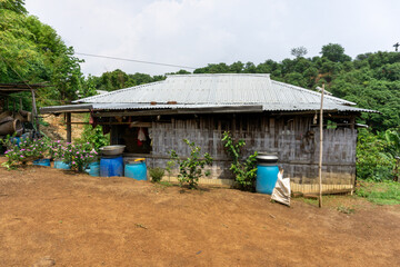 Adivasi homesteads on either side of the Bandarban hilly road. Tribal accommodation. Bandarban hill region is a tourist spot in Bangladesh.