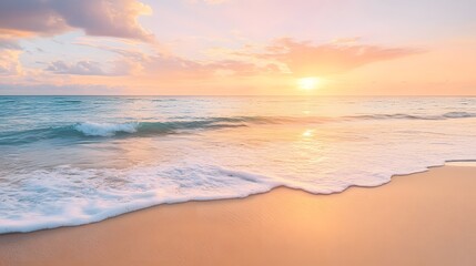 A tranquil beach at sunset with golden sand and gentle waves lapping the shore