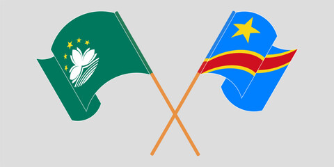 Crossed and waving flags of Macau and Democratic Republic of the Congo. Vector illustration