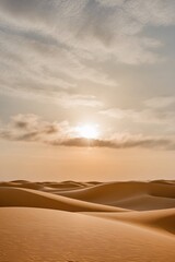 Golden Desert Landscape with Sun and Clouds.