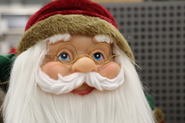 A delightful and cheerful Jolly Santa Claus Figurine perfect for enhancing your Holiday Decor