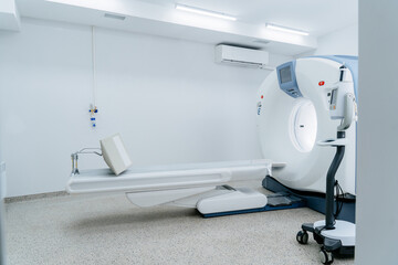 CT Scanning Room With Large Machine And Attached Computer Station