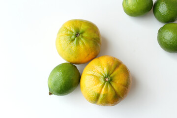 Brazilian tropical fruits, featuring oranges and limes. Antioxidants and vitamins for healthy vegetarian or vegan meal.