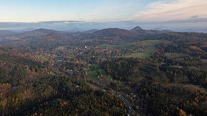 Obraz premium Autumn landscape in the mountains. village Kytlice, Czech Republic.